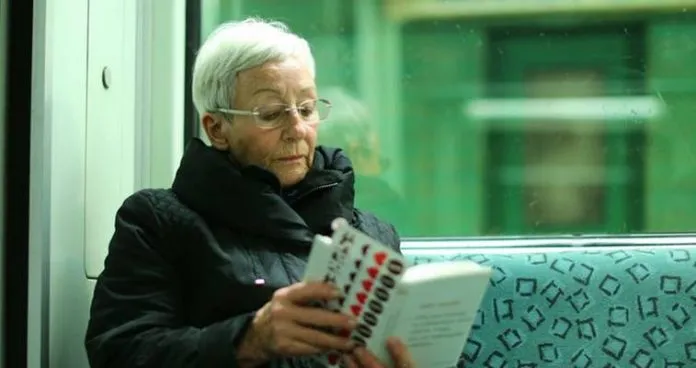 Woman reading on a train