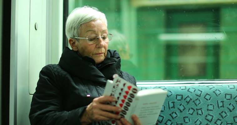 Woman reading on a train