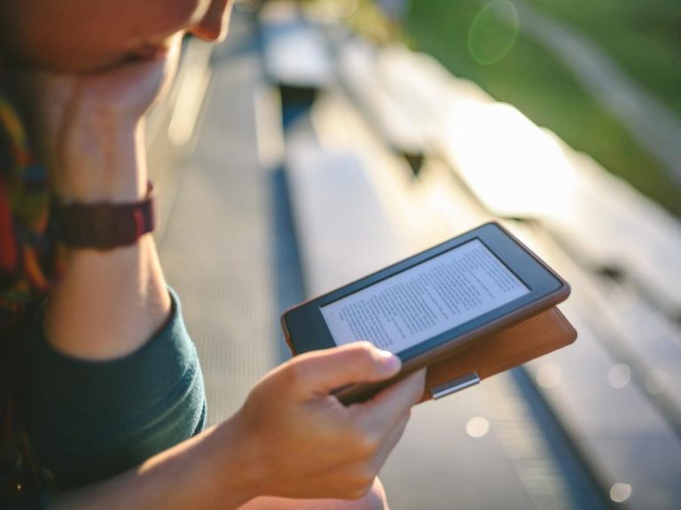 Person reading a tablet